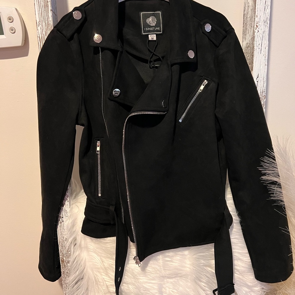 1 sunset lane jacket . Super cute, from a smoke free , pet free home .